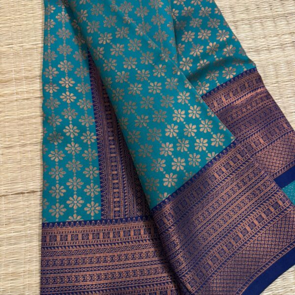 Aadhira in Peacock blue and Navy