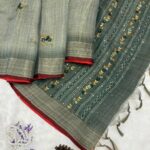 Sage green saree with French knots in Linen silk