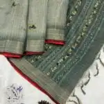 Sage green saree with French knots in Linen silk