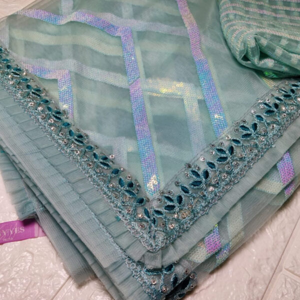 Netted cutwork designer saree in Turquoise